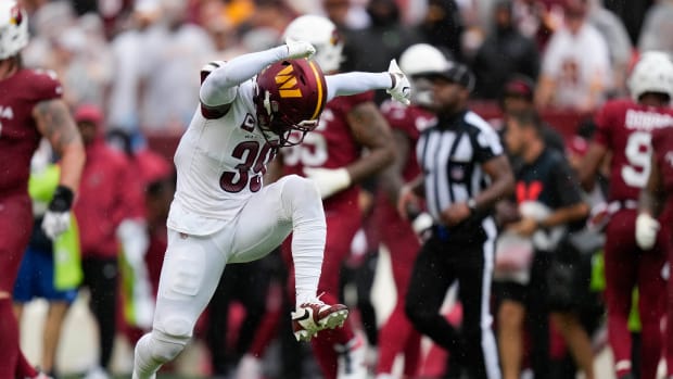 Washington Commanders safety Jeremy Reaves (39) reacts after a play in the second half against the Arizona Cardinals at FedExField.